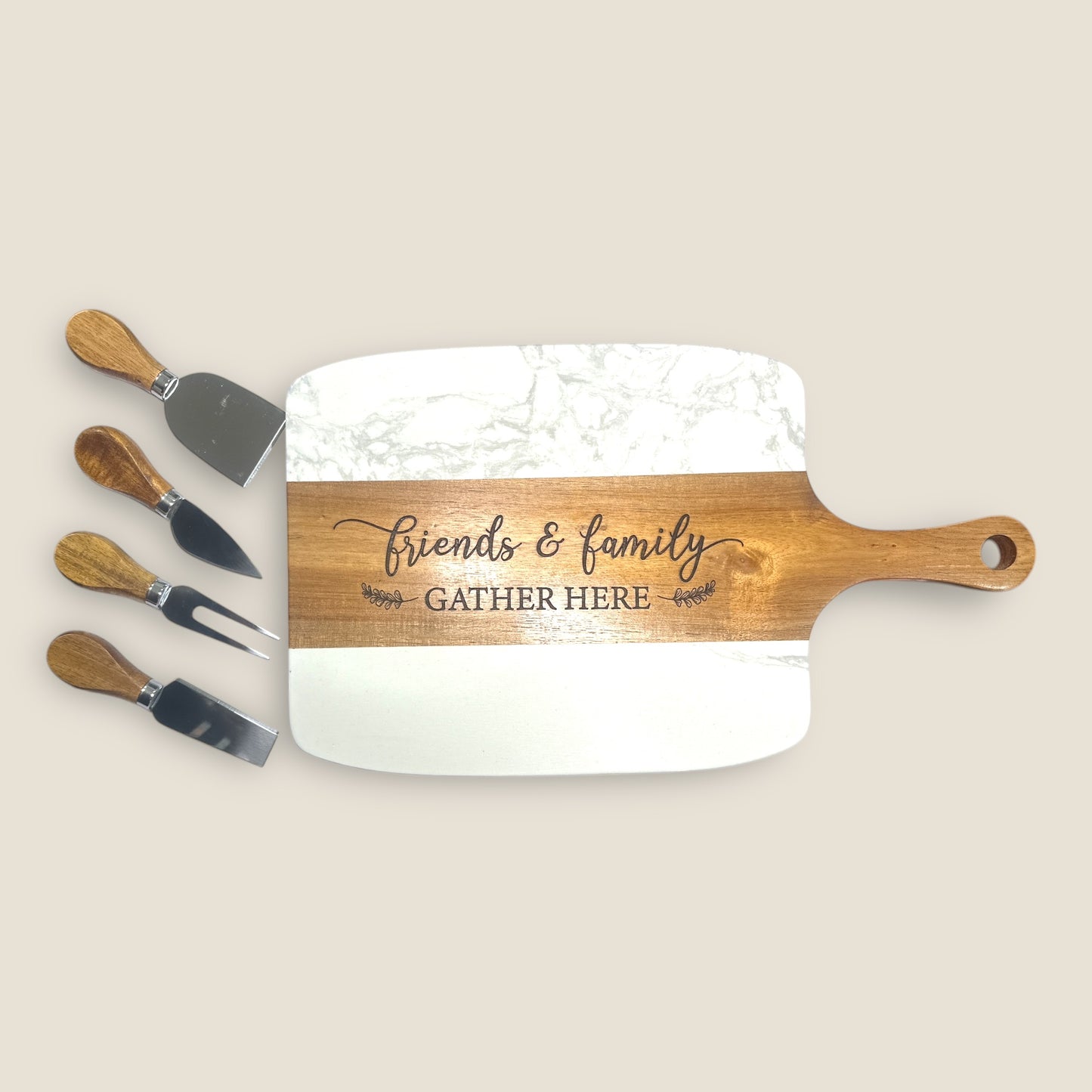 Marble and Acacia Charcuterie Board with serving utensils